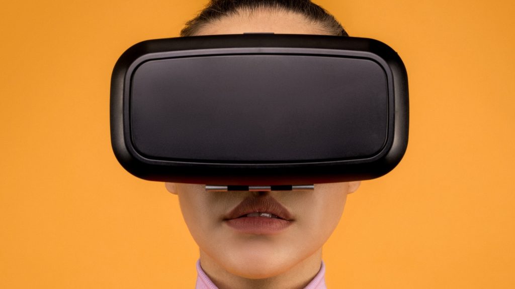 A lady with a headset on.